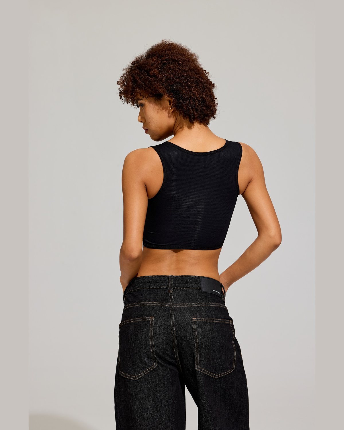 Side Hook Crop Binder in Black back view