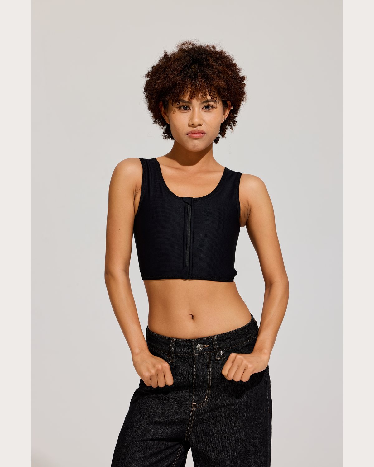 Front Zip Crop Binder in Black front view